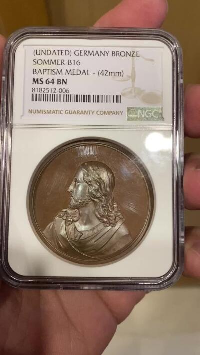 万国钱币拍卖第060期（万国六十期纪念大拍） NGC MS64 19世纪德国宗教洗礼铜章 背面是耶稣在约旦河中为约翰施洗的经典场景 转动时币面有圣光闪烁 原味高浮雕大规格收藏级品质