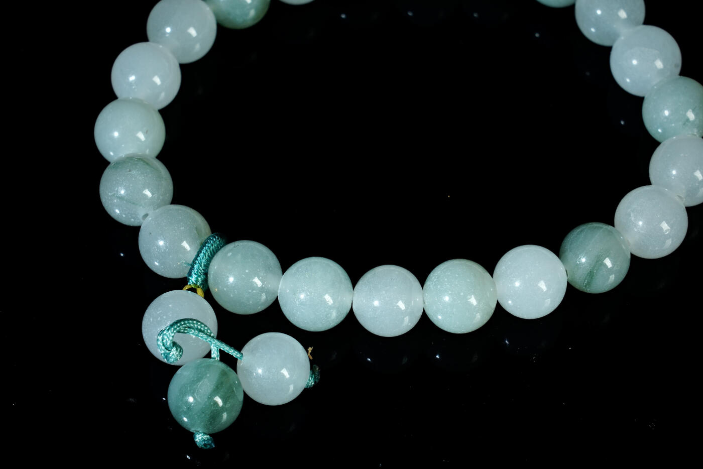 上海都达杂项专场二十八【全场包邮】 石英岩玉0.9圆珠手串 附鉴定证书