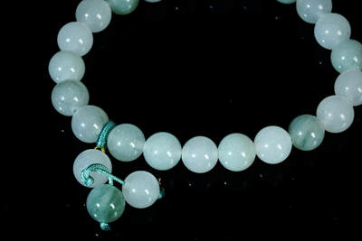 上海都达杂项专场90【全场包邮】  石英岩玉0.9圆珠手串 附鉴定证书