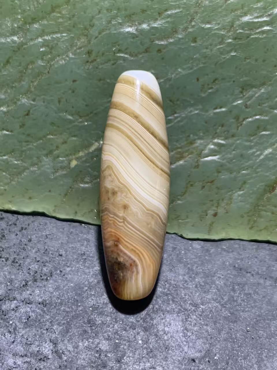 高玉化缠丝玛瑙随形通货桶珠一个