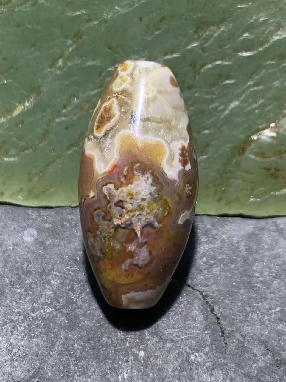 精美冰飘草花纹战国红玛瑙天珠形桶珠一个