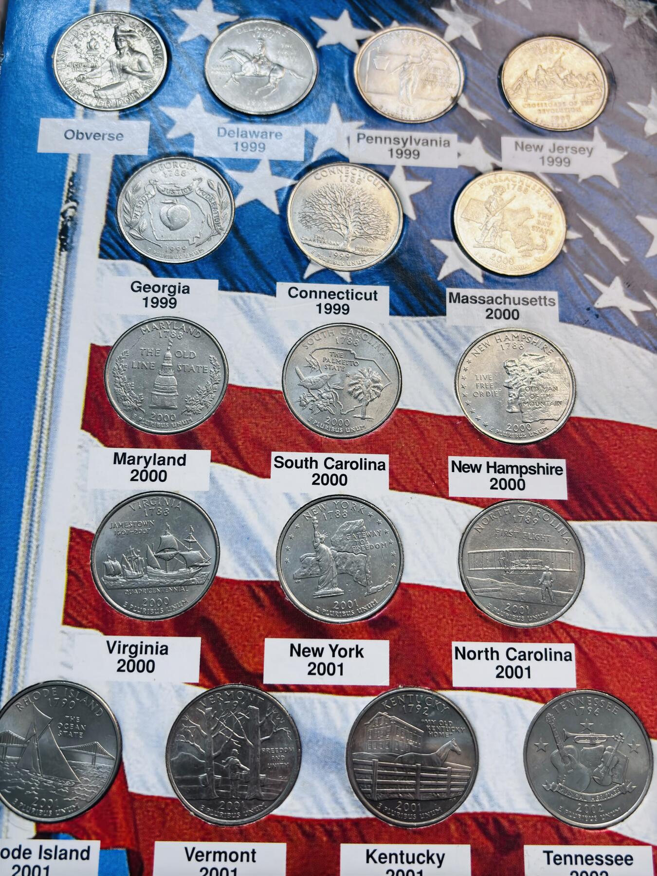 文馨钱币收藏第 293 场，春节前最后一期全部发出，将不予寄存，请悉知 好品美国 51 州币纪念币 25 美分一本，册子不完整