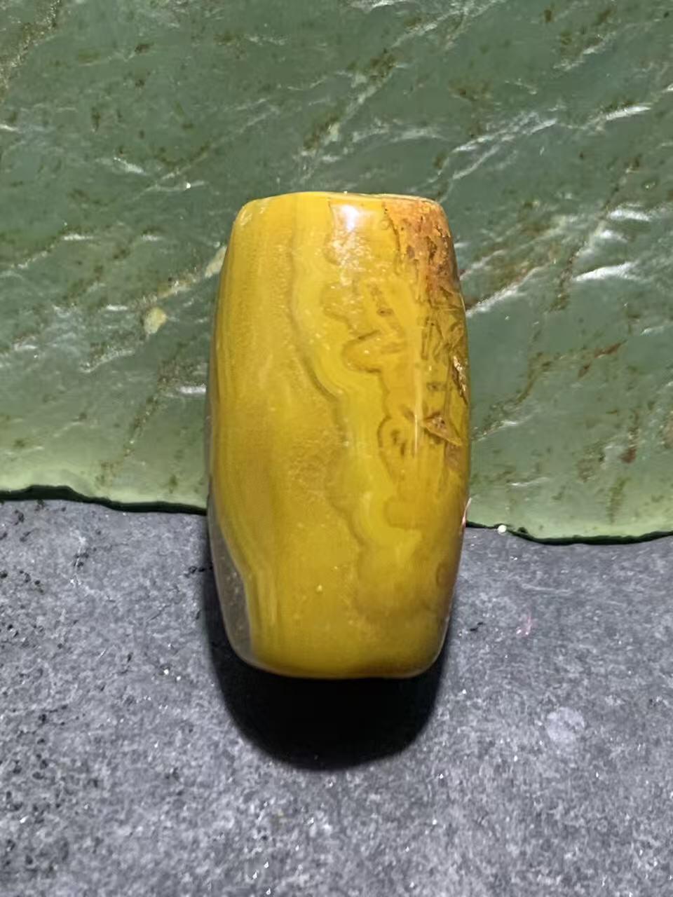 冰飘草花纹战国红玛瑙通货桶珠一颗！