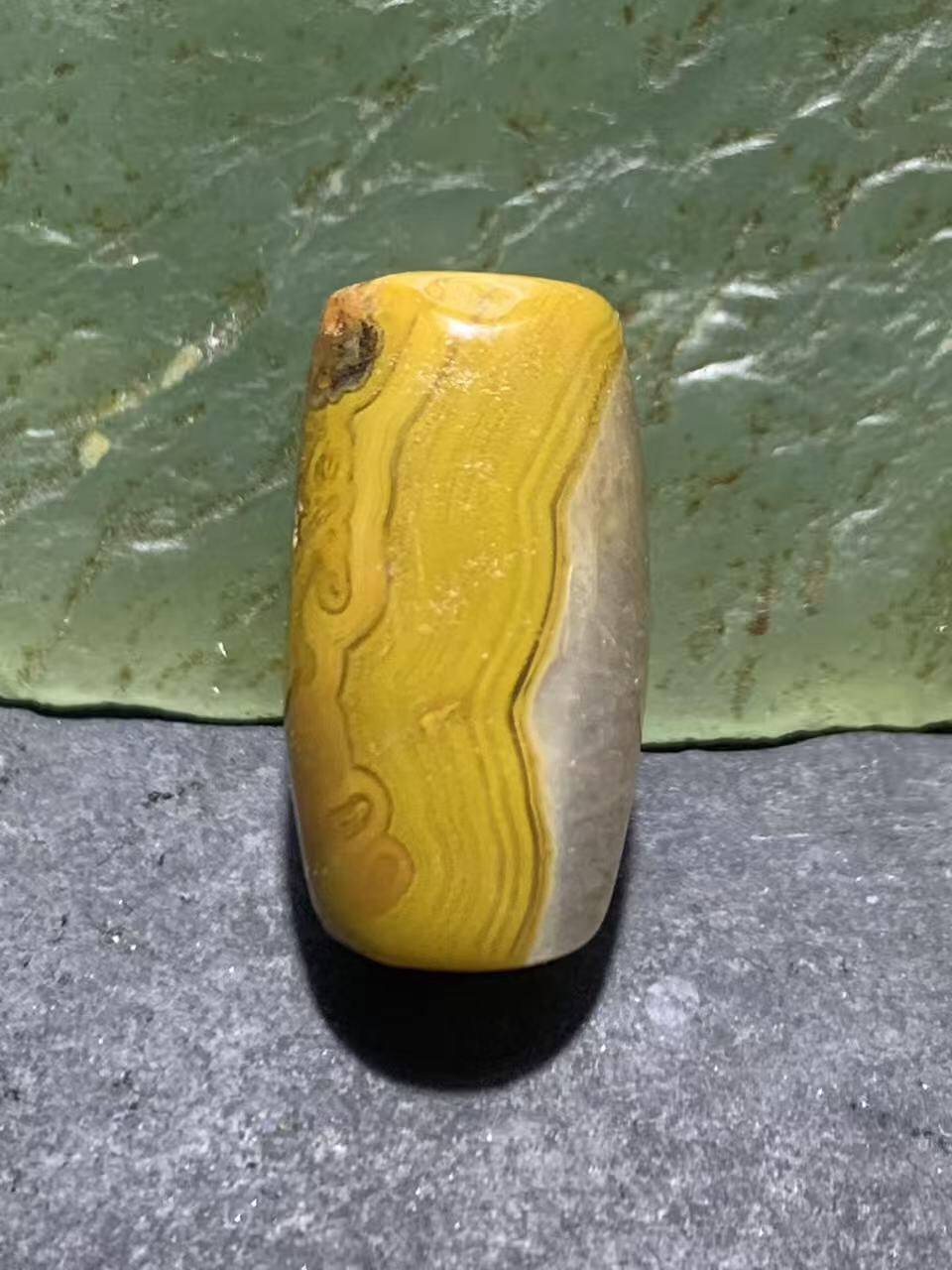 冰飘草花纹战国红玛瑙通货桶珠一颗！