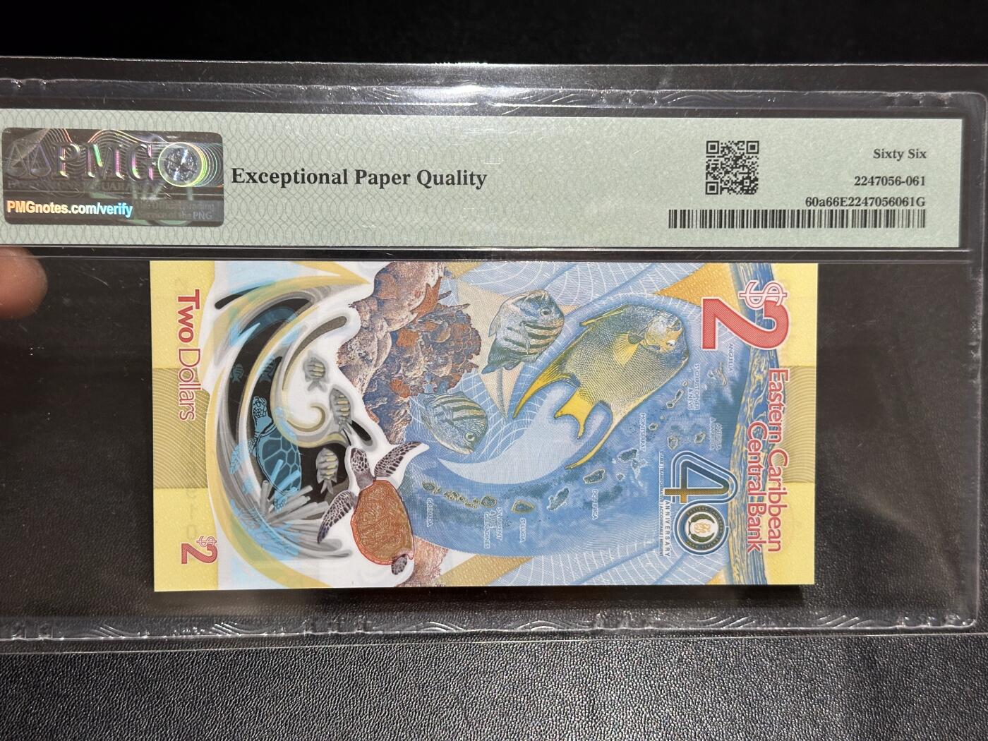 《外钞收藏家》第六百零八期（精选场）（本平台长期征集拍品、欢迎藏友们联系合作） 2023年东加勒比2元 纪念钞 PMG68 获奖钞 AA冠 倒置号 