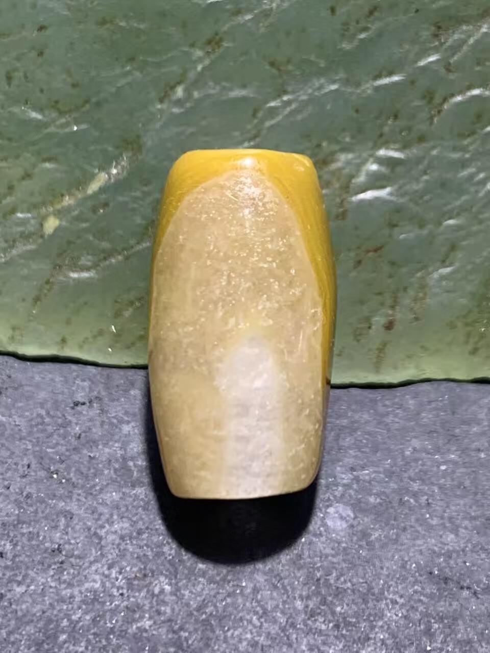 冰飘草花纹战国红玛瑙通货桶珠一颗！