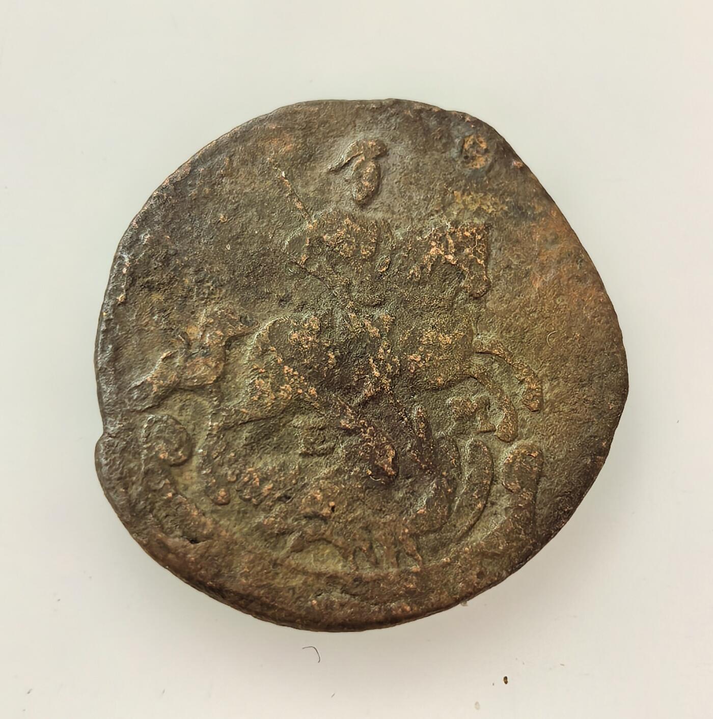 外国优质老铜币高银银币，周六九点倒数截拍，满百包邮，持续收拍，年后发货 沙俄叶卡捷琳娜二世1767年铜币，是农奴制经济背景下的小额流通货币，币面双头鹰与君主纹章象征帝国权威，见证了沙俄扩张阶段的社会经济与货币体系。