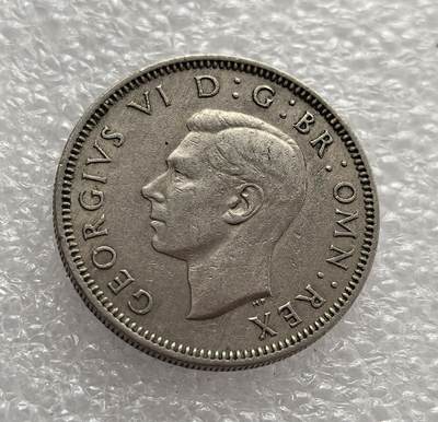 外国优质老铜币高银银币，周六九点倒数截拍，满百包邮，持续收拍，年后发货 - 英国 1950 年1 先令（英格兰版），属于乔治六世统治后期。币面的立狮与皇冠是英格兰的标志性设计，见证了二战后英国在经济复苏阶段维系英镑货币体系、巩固联合王国身份的历史。