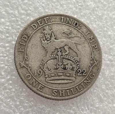 外国优质老铜币高银银币，周六九点倒数截拍，满百包邮，持续收拍，年后发货 - 英国 1922 年1 先令银币，属于乔治五世时期的流通货币。当时英国正处于战后经济复苏阶段，该币以 “皇冠上的狮子” 为设计，象征英国君主权威与国家稳定，是一战后英国维系货币体系与殖民霸权的重要见证。