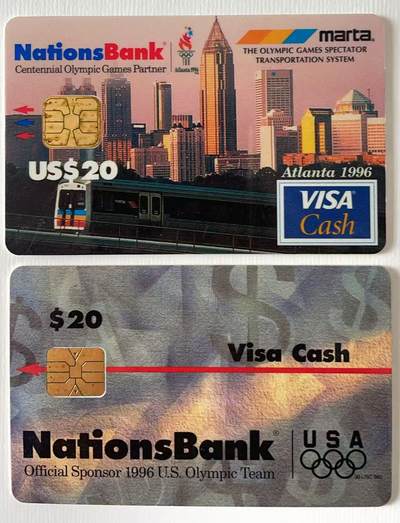 《卡拍》第344期拍卖2月7日晚22：10时延时截拍 - 美国国家银行VISA Cash现金卡《96亚特兰大奥运会美国队官方赞助商》试用IC卡一枚，《亚特兰大奥运公交专线》IC卡一枚（可用于该专线公交），芯片有氧化，中上品。