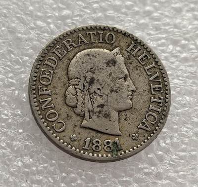 外国优质老铜币高银银币，周六九点倒数截拍，满百包邮，持续收拍，年后发货 - 瑞士联邦 1881 年10 分，属于瑞士法郎体系的早期流通货币。当时瑞士正处于工业化快速发展阶段，币面的海尔维蒂亚女神头像象征瑞士民族身份，花环设计延续传统风格，见证了瑞士中立国的经济稳定与货币体系的成熟。