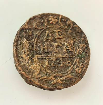 外国优质老铜币高银银币，周六九点倒数截拍，满百包邮，持续收拍，年后发货 - 沙俄伊丽莎白一世1748 年铜币，是农奴制经济背景下的小额流通货币。币面双头鹰国徽象征沙皇专制权威，磨损的币面反映了当时的流通痕迹，见证了 18 世纪中期俄国封建农奴制社会的经济体系。