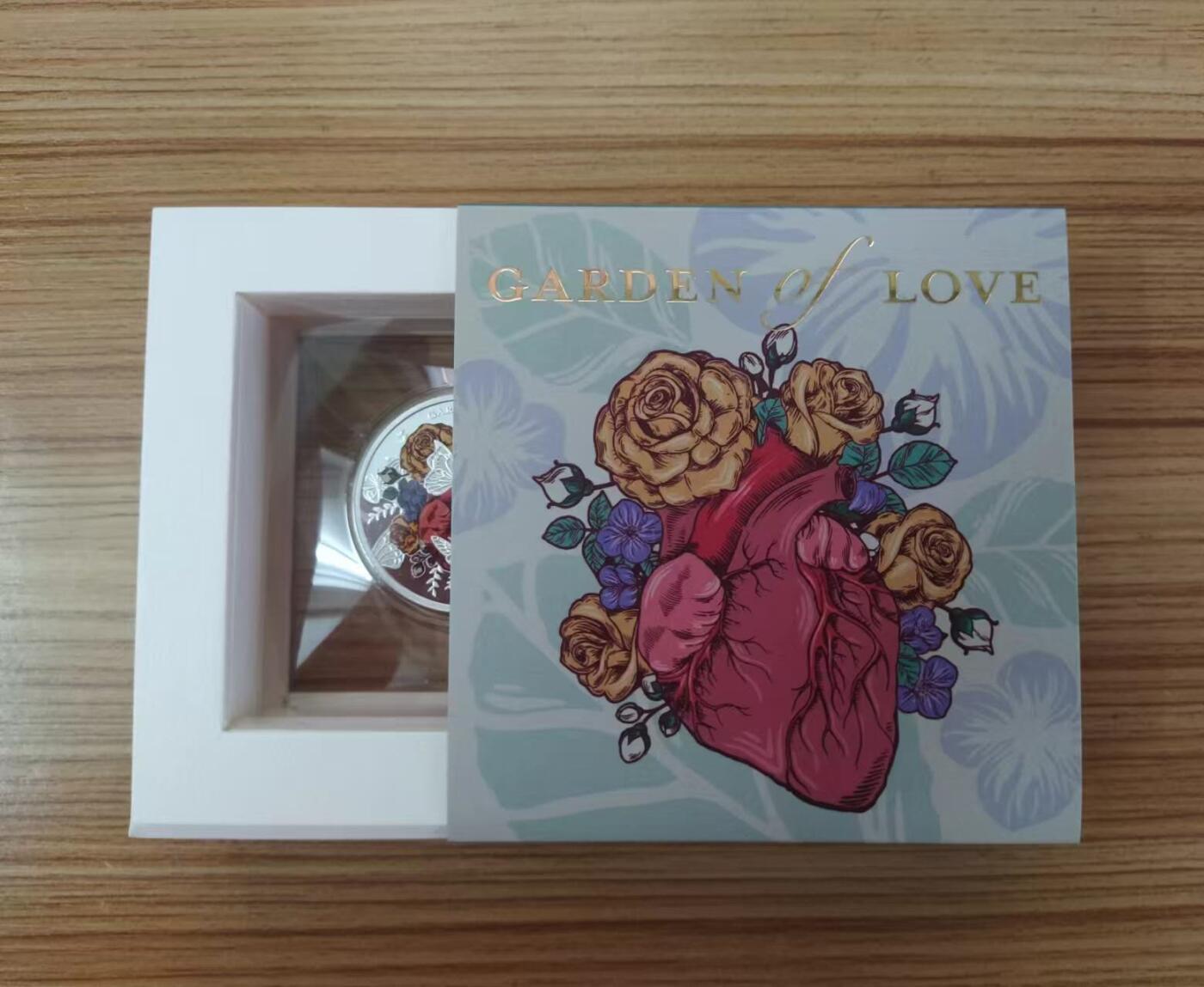 【币海沉浮】国际金银币（2） 喀麦隆2023，“爱的花园”，激光镭射磨砂,鲜艳数码彩色,microprinting缩微美化防伪技术,彩色精制银币. 盒证全. 超精美漂亮