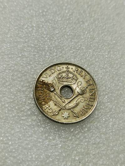 天下钱庄专场欢迎参拍 - 新几内亚中孔银币