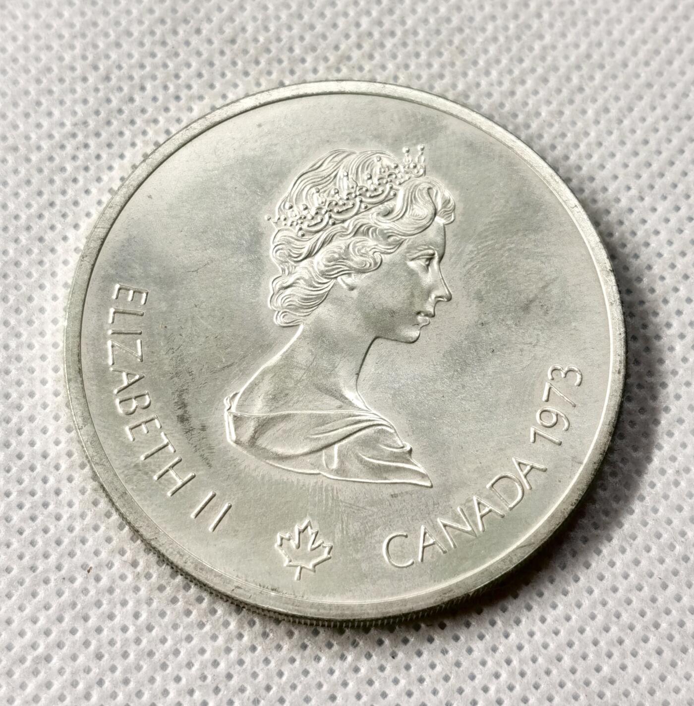 甄臻铺-世界币章拍卖（第49期）精品场拍品征集中，送拍享返佣金等优惠多多 1973加拿大奥运会银币 48.6克（含银92.5%）