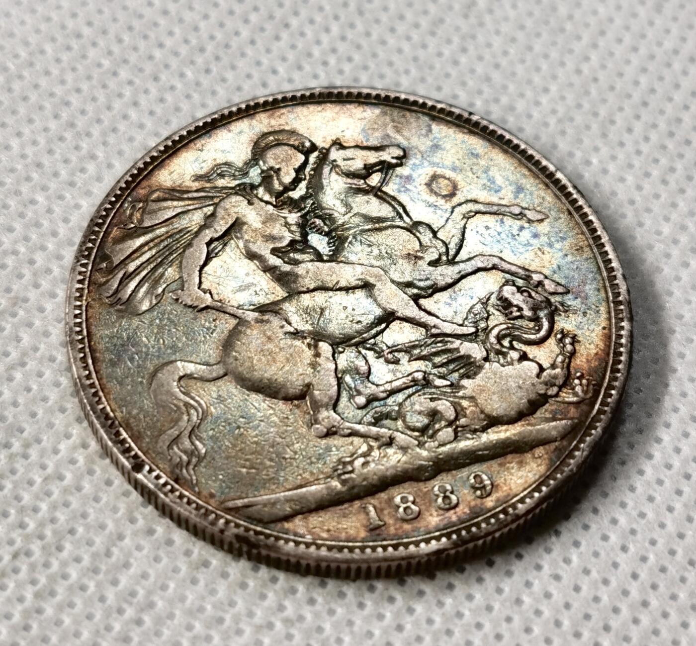 甄臻铺-世界币章拍卖（第49期）精品场拍品征集中，送拍享返佣金等优惠多多 1889马剑银币，黑色五彩包浆，细节见图，2枚一组