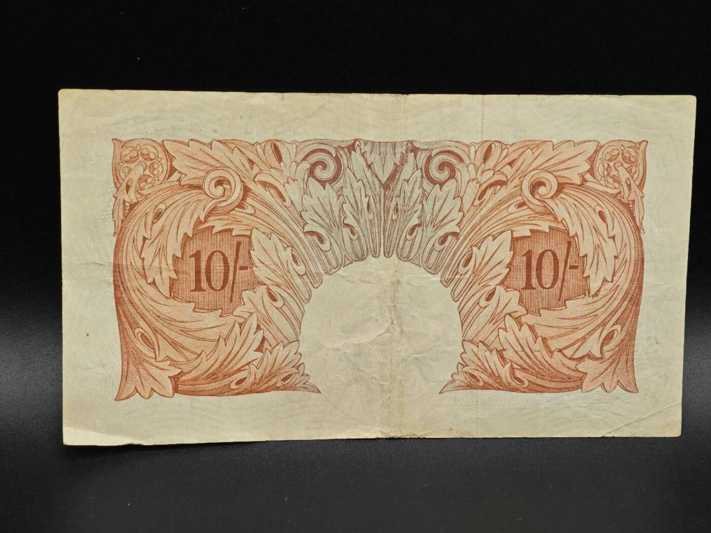 【淘币小摊】实时拍第八百六十五拍   纸币场    年前最后一周之前预留预留8号9号全部发出请更换最新收货地址不方便收货的请勿参拍或者顺丰到付 英国英格兰银行十先令纸币【有折】