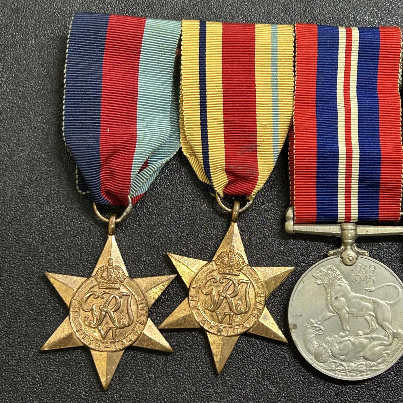 西秦中古拍卖第七十五期 英国二战非洲服役奖章联排 同一人获得 有铭文 最后一枚为银制