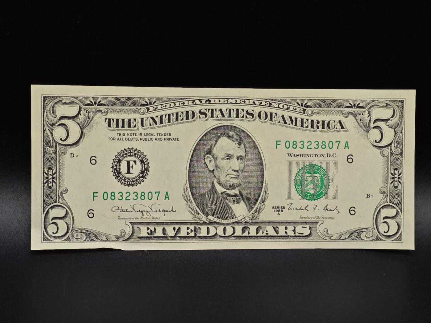 【淘币小摊】实时拍第八百六十五拍   纸币场    年前最后一周之前预留预留8号9号全部发出请更换最新收货地址不方便收货的请勿参拍或者顺丰到付 美国5美元纸币【有折】