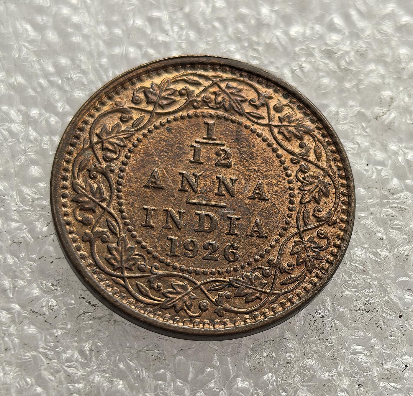 外国优质老铜币高银银币，周六九点倒数截拍，满百包邮，持续收拍，年后发货 极美品带光1926 年英属印度 1/12 安娜铜币，是英国殖民统治印度时期的流通货币，币面乔治五世头像标注 “KING EMPEROR”，见证了英国对印度的殖民经济体系与历史阶段。