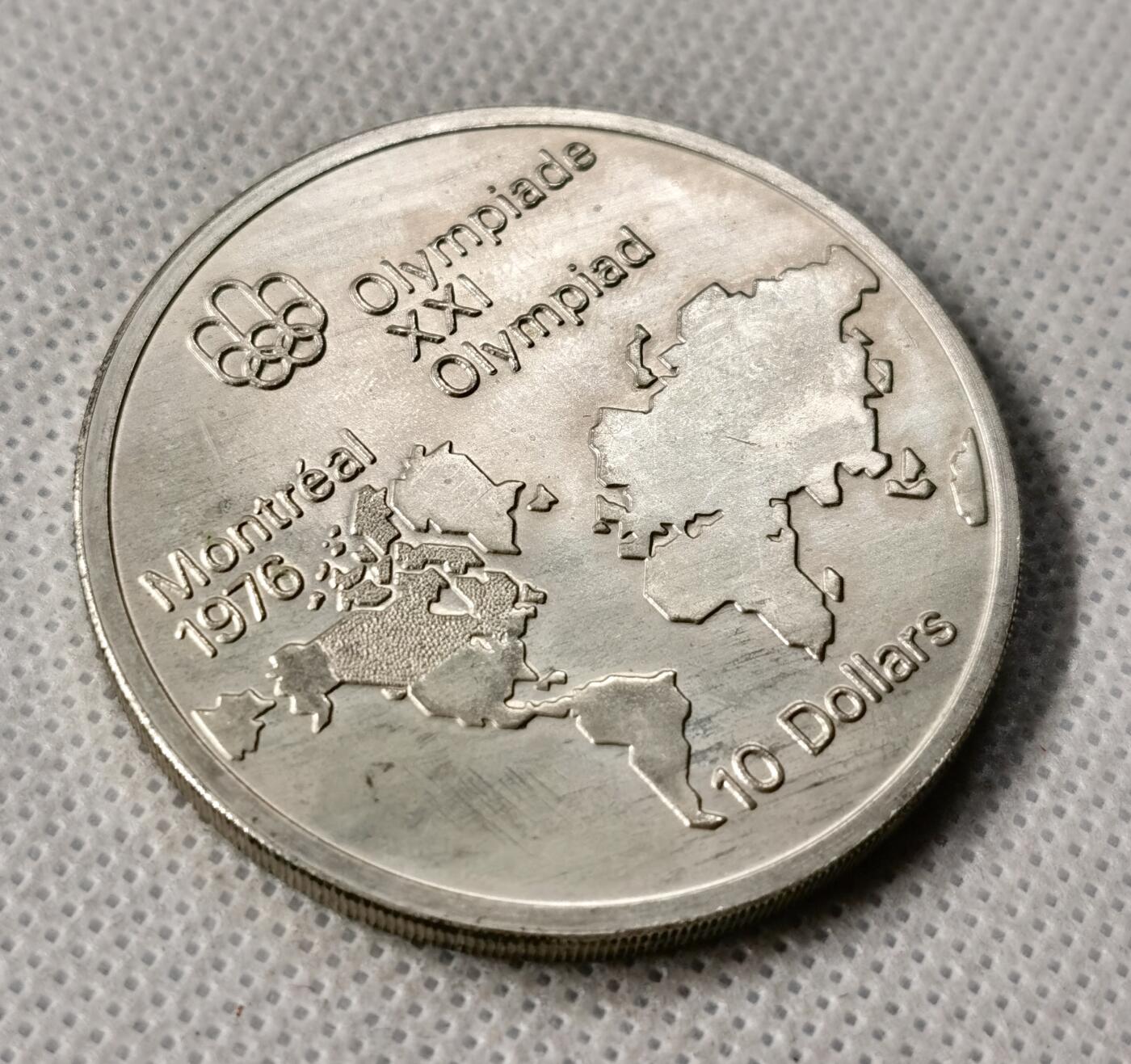 甄臻铺-世界币章拍卖（第49期）精品场拍品征集中，送拍享返佣金等优惠多多 1973加拿大奥运会银币 48.6克（含银92.5%）