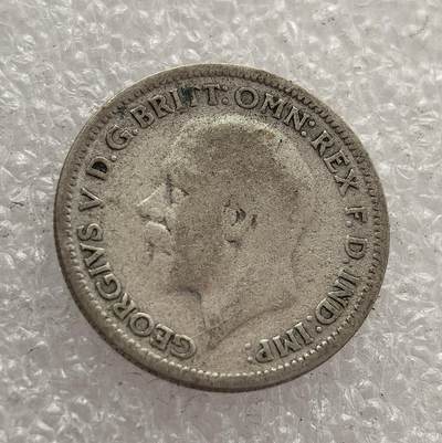 外国优质老铜币高银银币，周六九点倒数截拍，满百包邮，持续收拍，年后发货 - 英国 1931 年六便士银币，属于乔治五世时期的流通货币。当时英国正处于经济大萧条阶段，该币以橡树图案为设计，象征着英国的坚韧与稳定，是 20 世纪 30 年代英国应对经济危机、维系货币体系的重要见证。