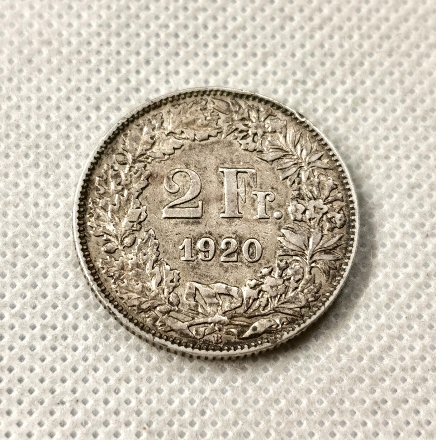 甄臻铺-世界币章拍卖（第49期）精品场拍品征集中，送拍享返佣金等优惠多多 瑞士女神2法郎1920年，好彩包浆，10克