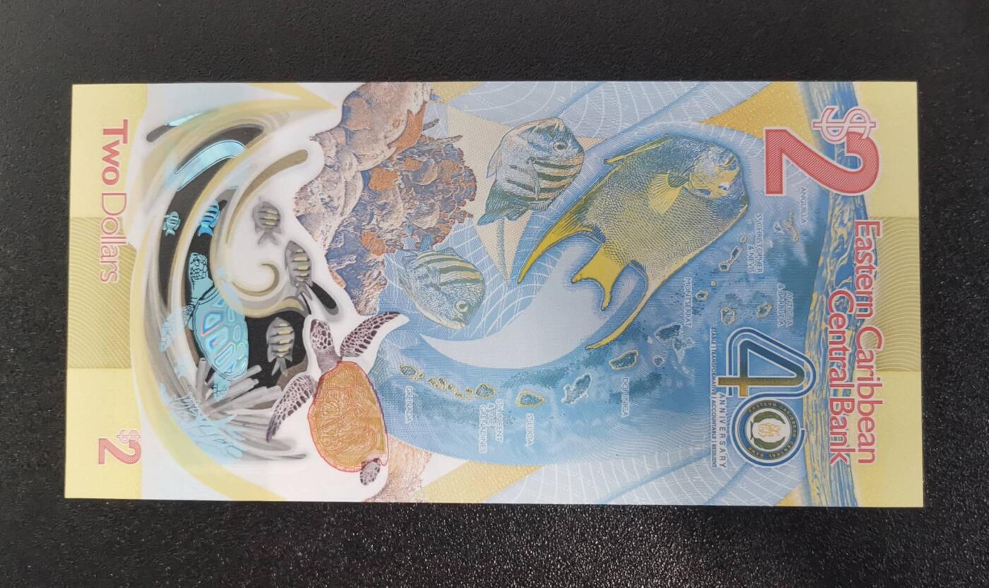 《艾美收藏》第231期-2.8周日外币精品(春节前收官)-世界最佳纸币特辑 东加勒比2023年首发AA冠2元UNC无47，央行成立40周年纪念钞，IBNS获奖钞 Pick#60a	陈