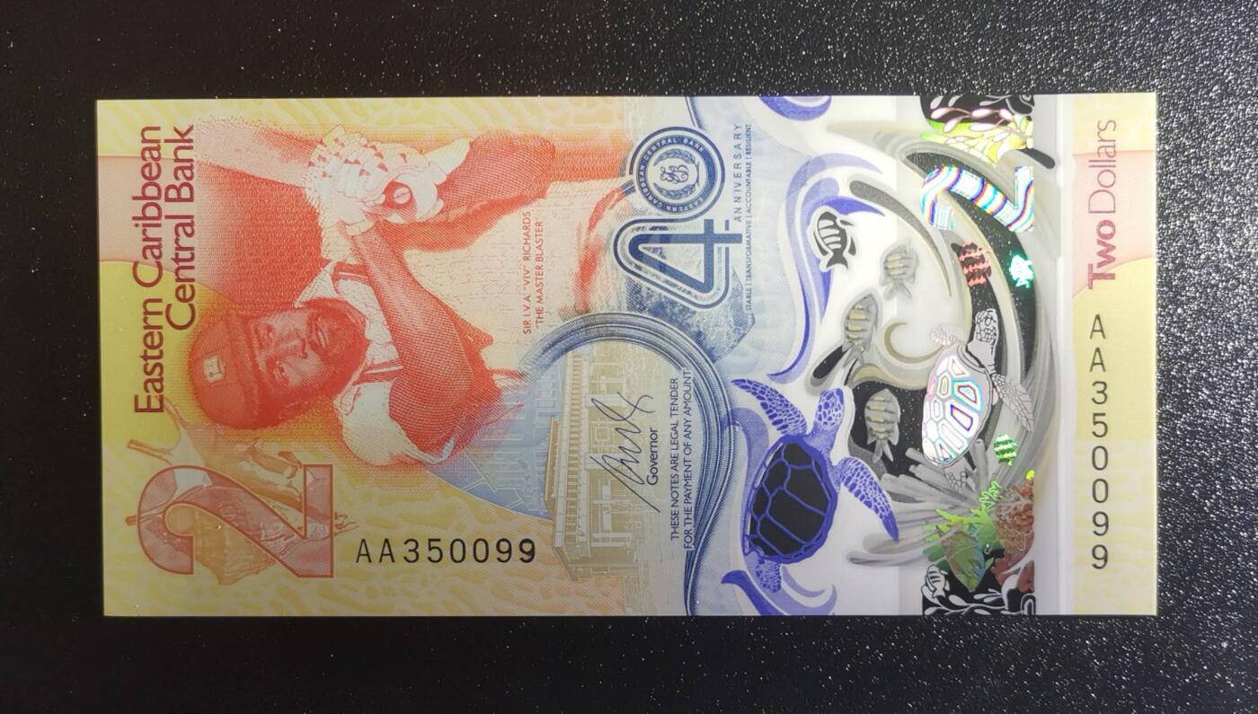 《艾美收藏》第231期-2.8周日外币精品(春节前收官)-世界最佳纸币特辑 东加勒比2023年首发AA冠2元UNC无47，央行成立40周年纪念钞，IBNS获奖钞 Pick#60a	陈