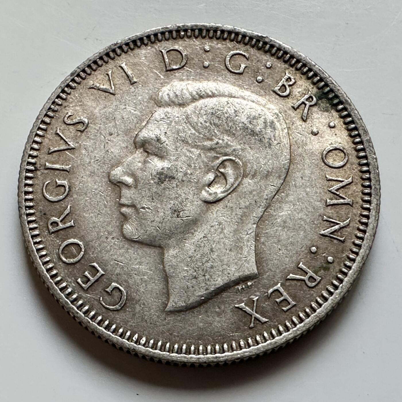 🌹外币初藏🌹🐯2026年第17场 快递将在12号停运 年前需发货的抓紧 ，年后正月十五恢复发货 英国1945年一先令银币 5.65克50%银