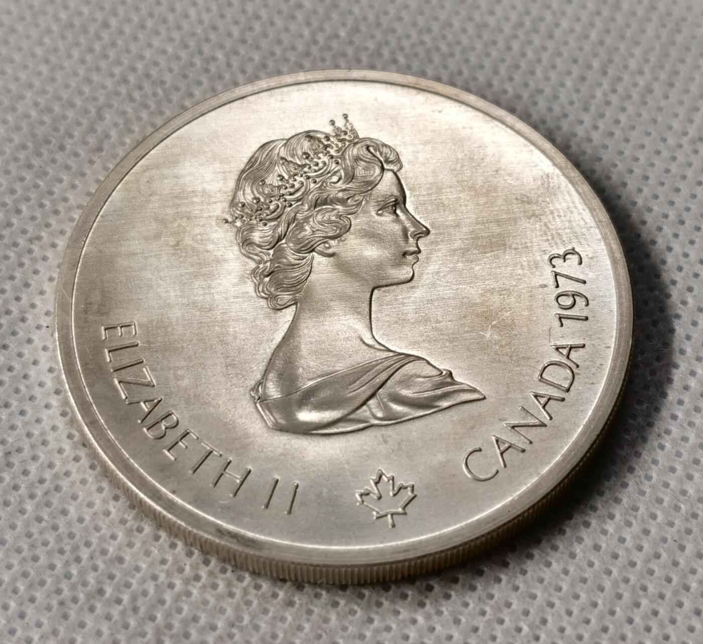 甄臻铺-世界币章拍卖（第49期）精品场拍品征集中，送拍享返佣金等优惠多多 1973加拿大奥运会银币 48.6克（含银92.5%）