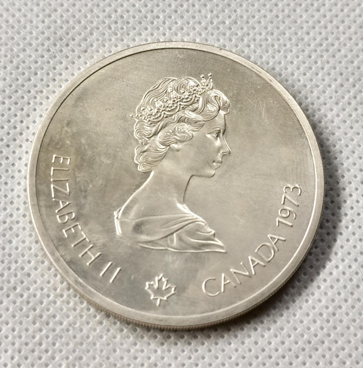 甄臻铺-世界币章拍卖（第49期）精品场拍品征集中，送拍享返佣金等优惠多多 1973加拿大奥运会银币 48.6克（含银92.5%）