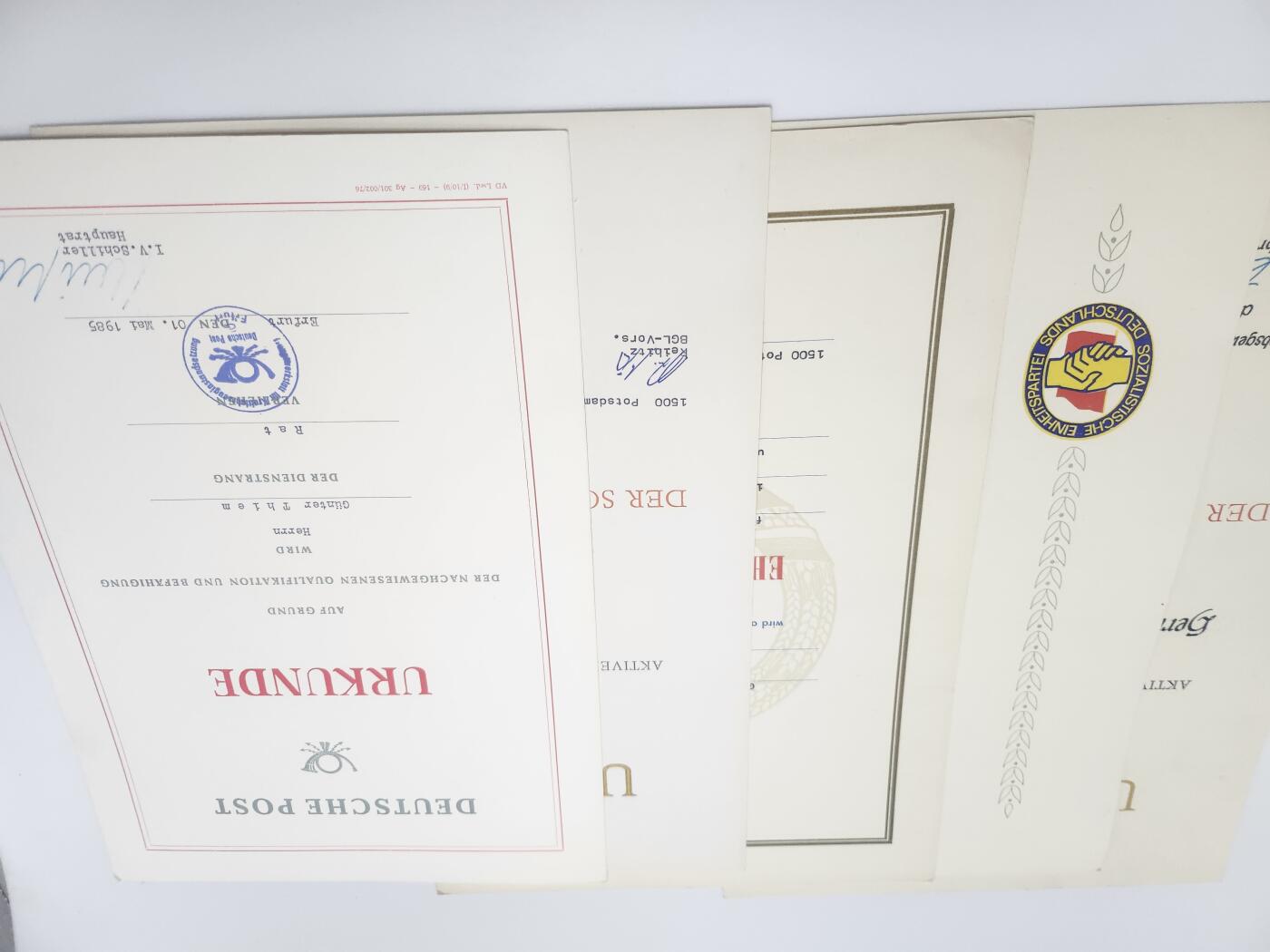 南水社第二次拍卖 民主德国波茨坦邮政负责人套证。任职证明、邮政等级资格证书、社会主义劳动积极分子荣誉证书、奖金证书、党内任职文件、工作通知及退休文件共计45张