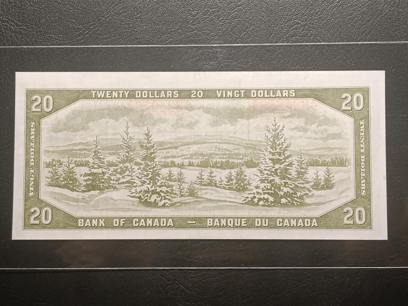 【年前末拍！】2026二月第二期，总216期 加拿大1954版20元“魔鬼脸”版本首签AUNC，因新发行纸币的女王发型可以看出来一个魔鬼向下看的脸而被舆论攻击，从而紧急改版，导致此版本稀少