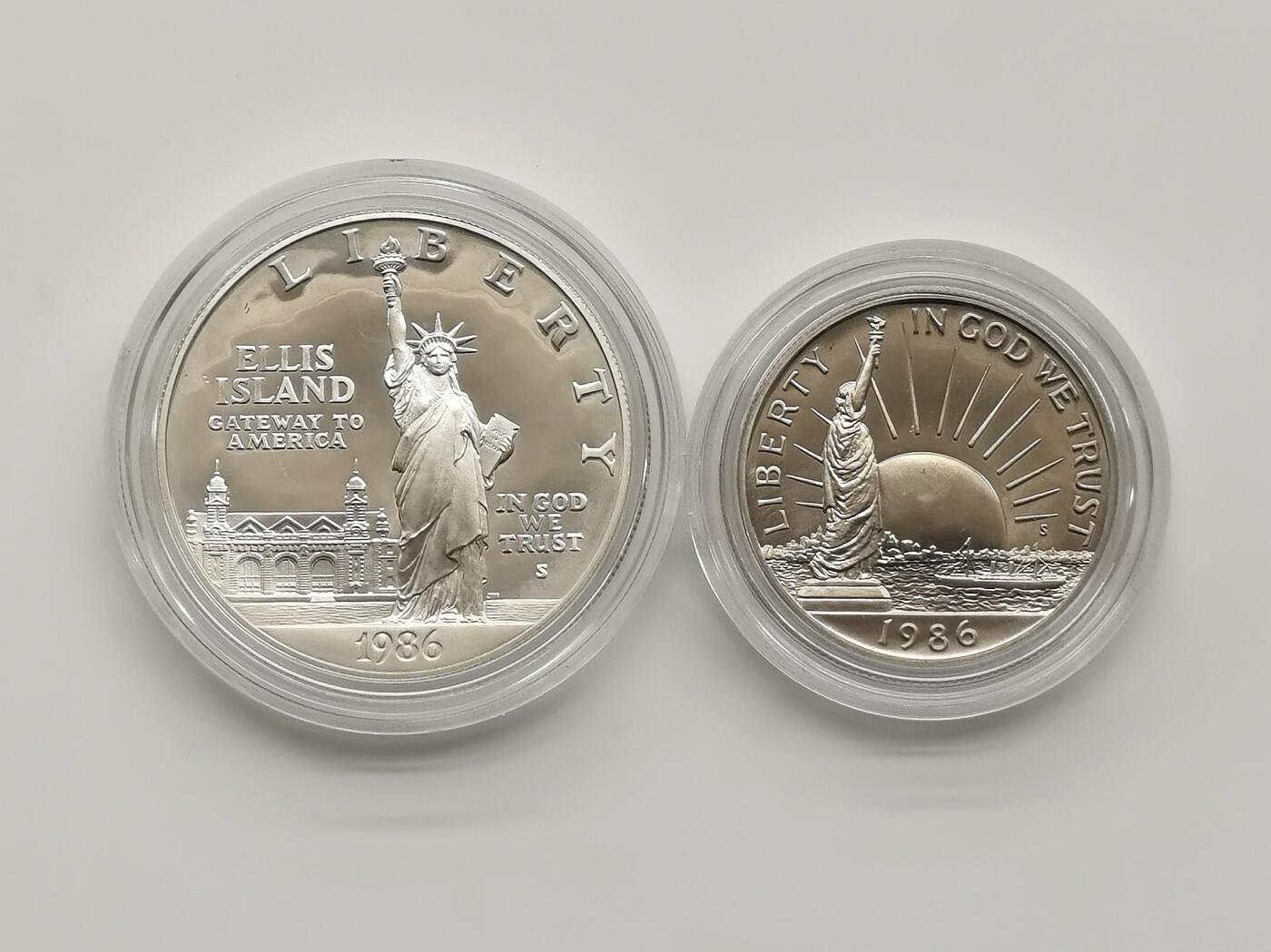 博洋堂“心向春光”2月精品大拍专场暨第160期（全场包邮） 1986年美国1元和50分精制币套 自由女神像（1美元精制银币）900银26.73克 盒证全