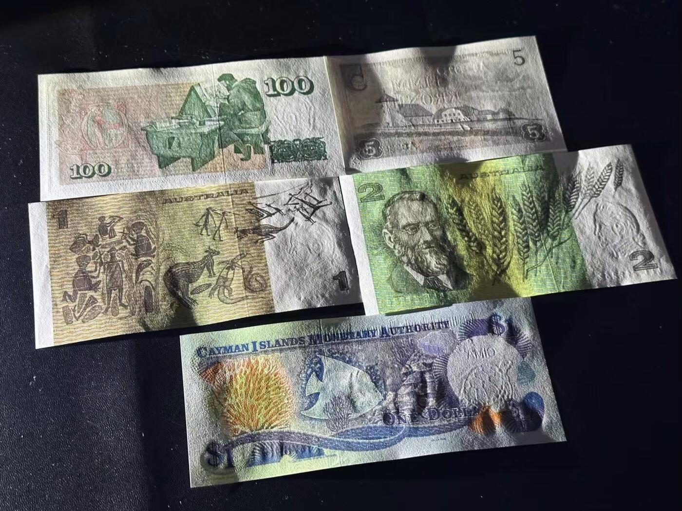 《外钞收藏家》第六百零九期（农历年前收官场、本期年后快递恢复正常再发货）（本平台长期征集拍品、欢迎藏友们联系合作） 冰岛、澳大利亚、开曼 5张一起 全新 3张轻微潮