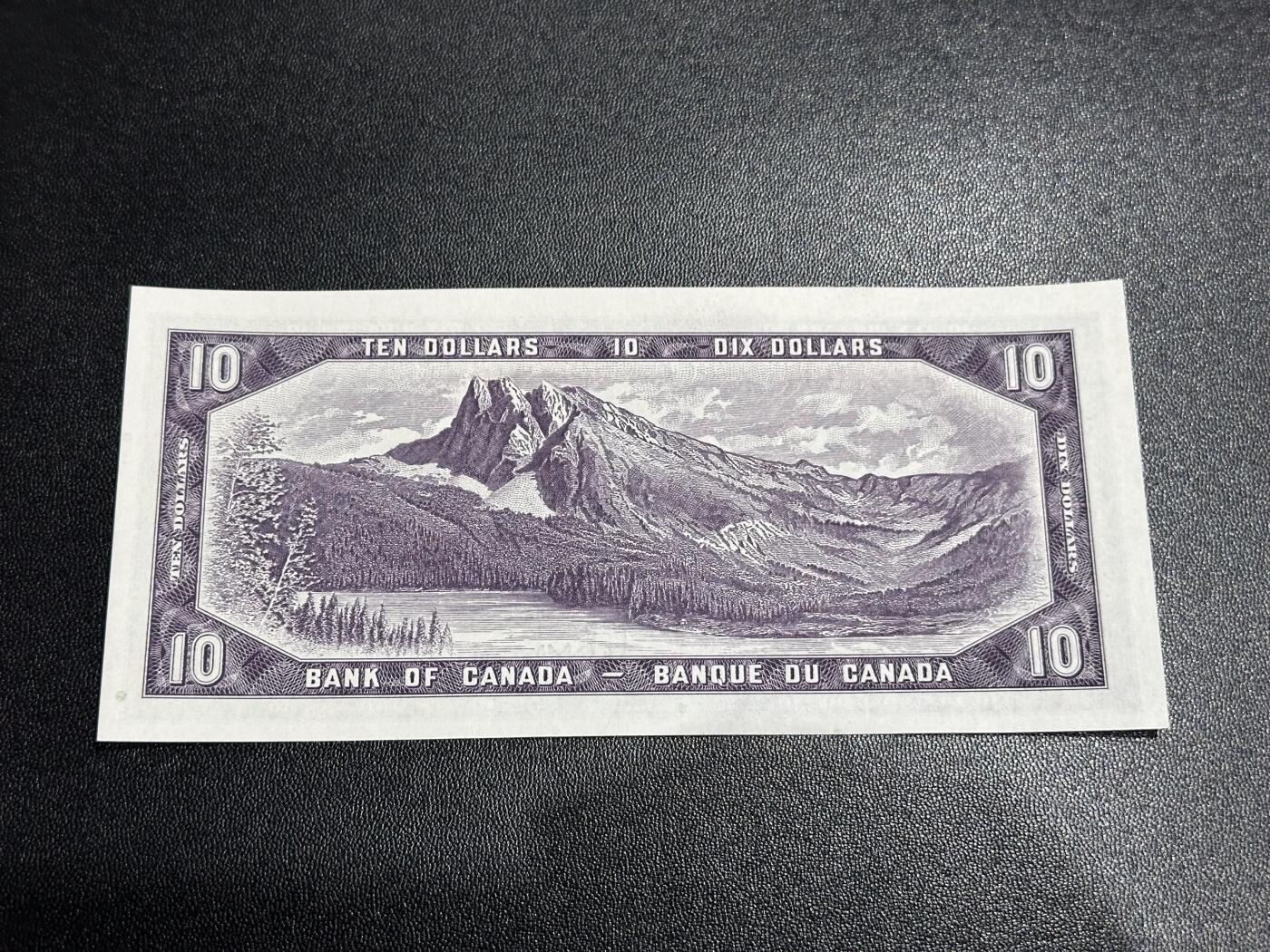 《外钞收藏家》第六百零九期（农历年前收官场、本期年后快递恢复正常再发货）（本平台长期征集拍品、欢迎藏友们联系合作） 加拿大1954年风景版10元（老版纸币UNC较少）		UNC