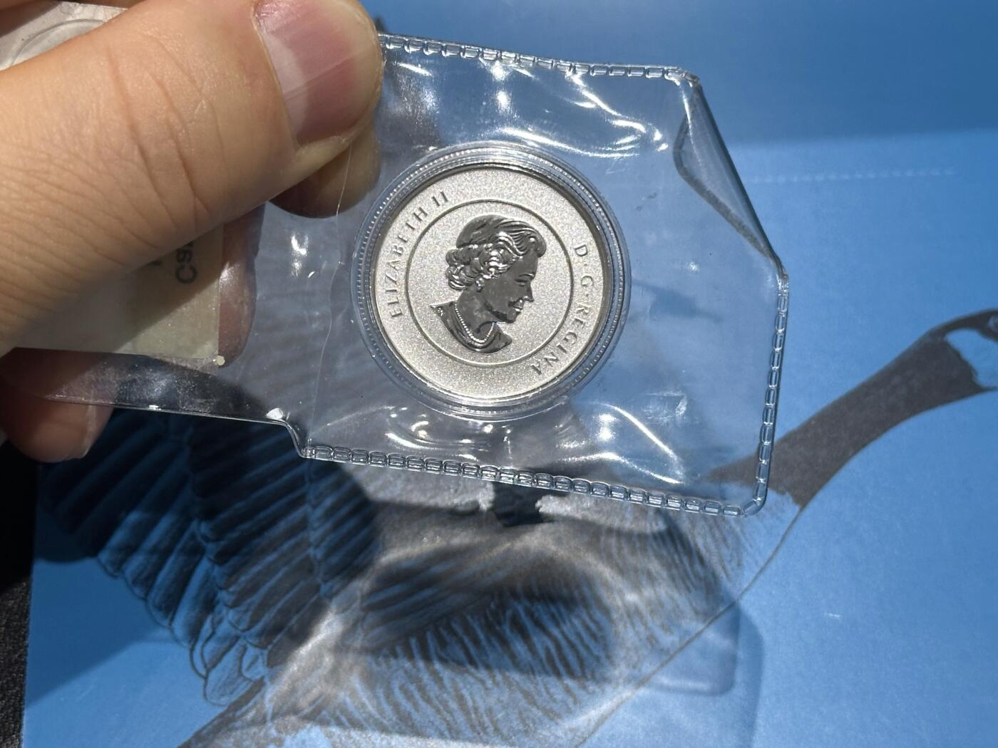 《外钞收藏家》第六百零九期（农历年前收官场、本期年后快递恢复正常再发货）（本平台长期征集拍品、欢迎藏友们联系合作） 加拿大2013年20加元加拿大大鹅卡装纪念精制银币（8g纯银）