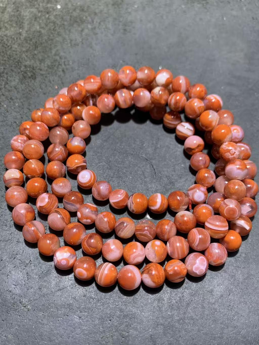 川料南红玛瑙柿子红冰飘多圈手串一条，