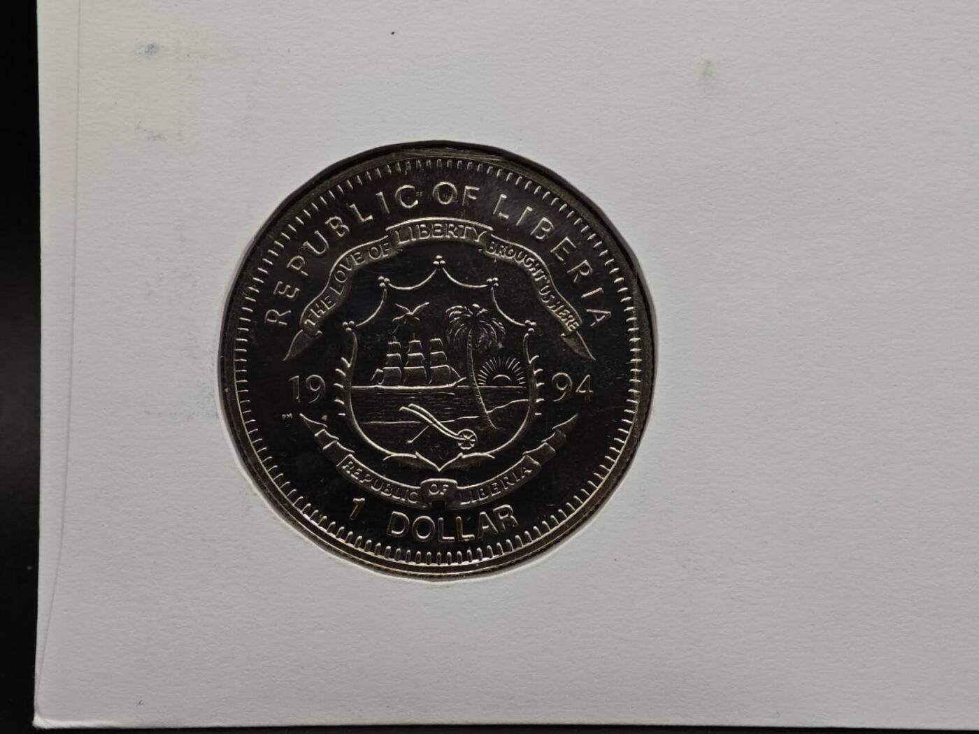  【淘币小摊】限时拍第八百七十拍   克朗币邮币封场    年前最后一场结束全部发出请更换最新收货地址不方便收货的请勿参拍或者顺丰到付 利比里亚1994年F1赛车1元纪念币邮币封