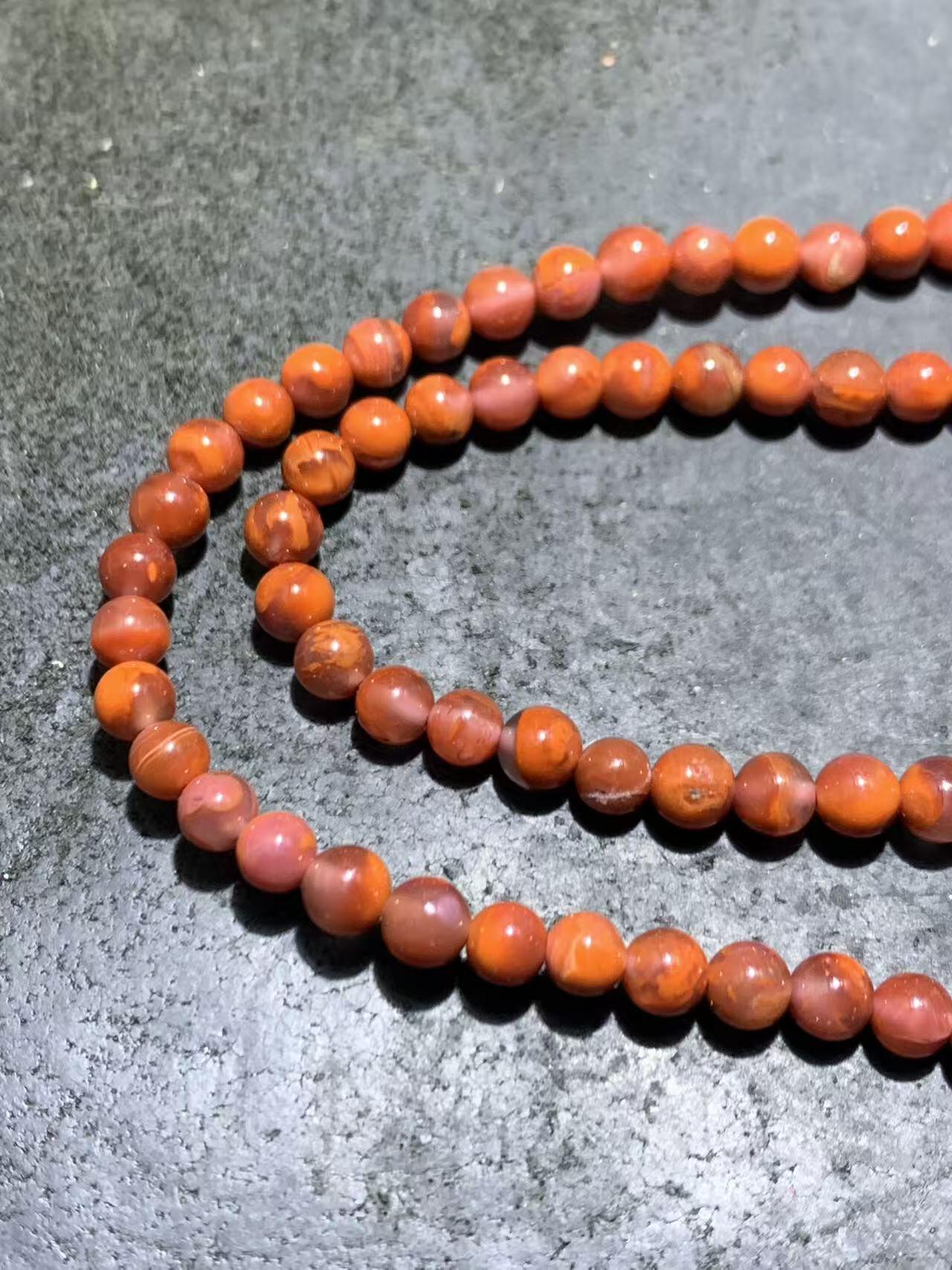 川料南红玛瑙冰飘柿子红多圈手串一条，