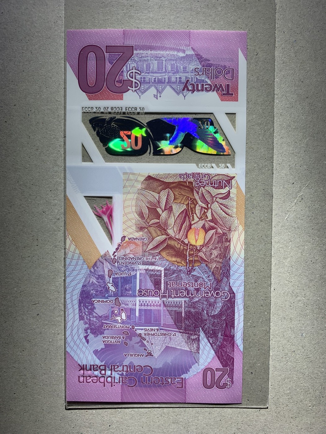 【礼羽收藏】🌏世界钱币拍卖第132期 【PQ188998】全新UNC 2019年东加勒比20面值 塑料钞 无3457尾8 倒置号