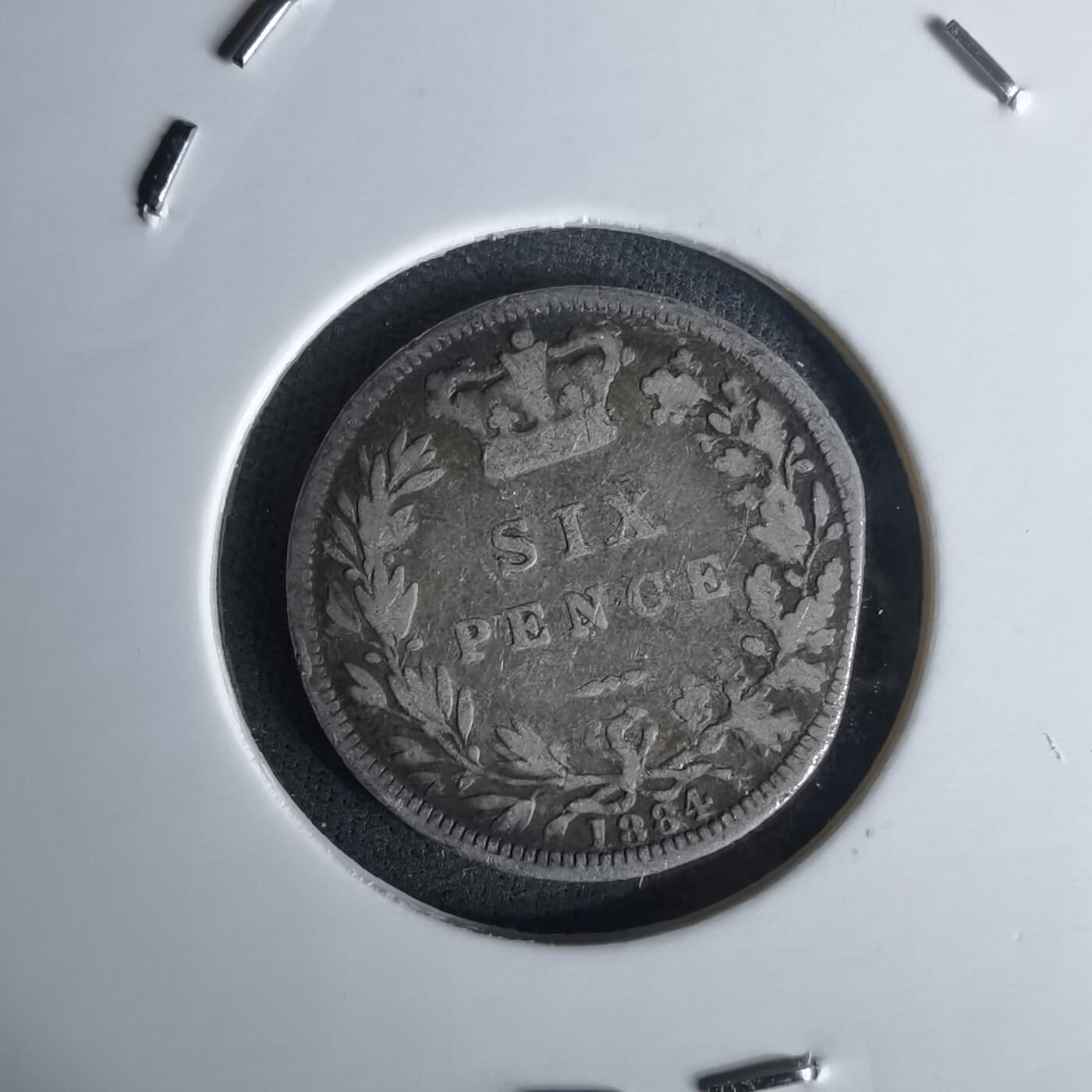 沼泽如烟--第991场 英国1884年6便士银币