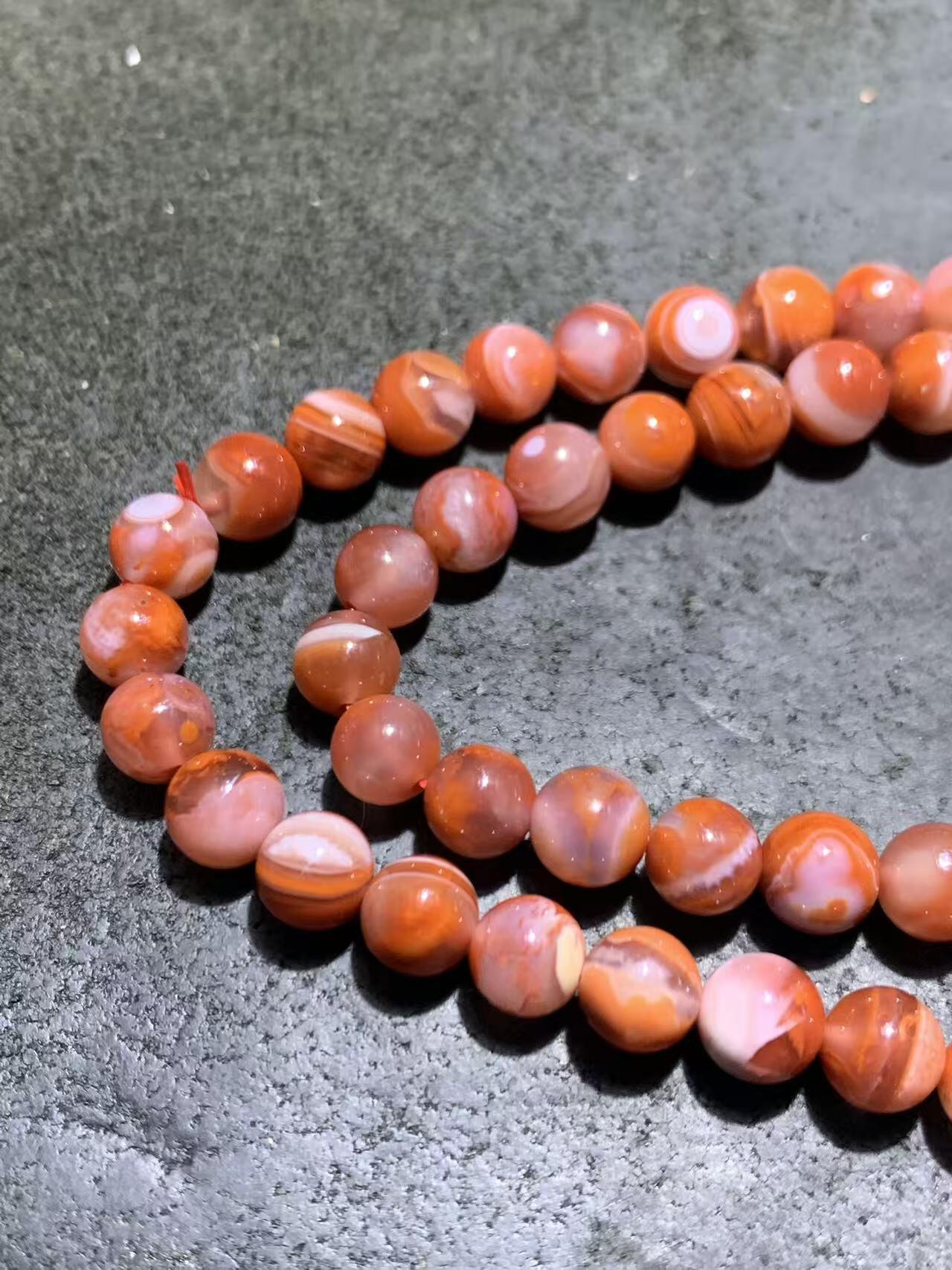 川料南红玛瑙柿子红冰飘多圈手串一条，