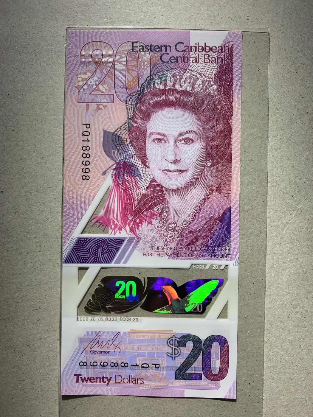 【礼羽收藏】🌏世界钱币拍卖第132期 【PQ188998】全新UNC 2019年东加勒比20面值 塑料钞 无3457尾8 倒置号