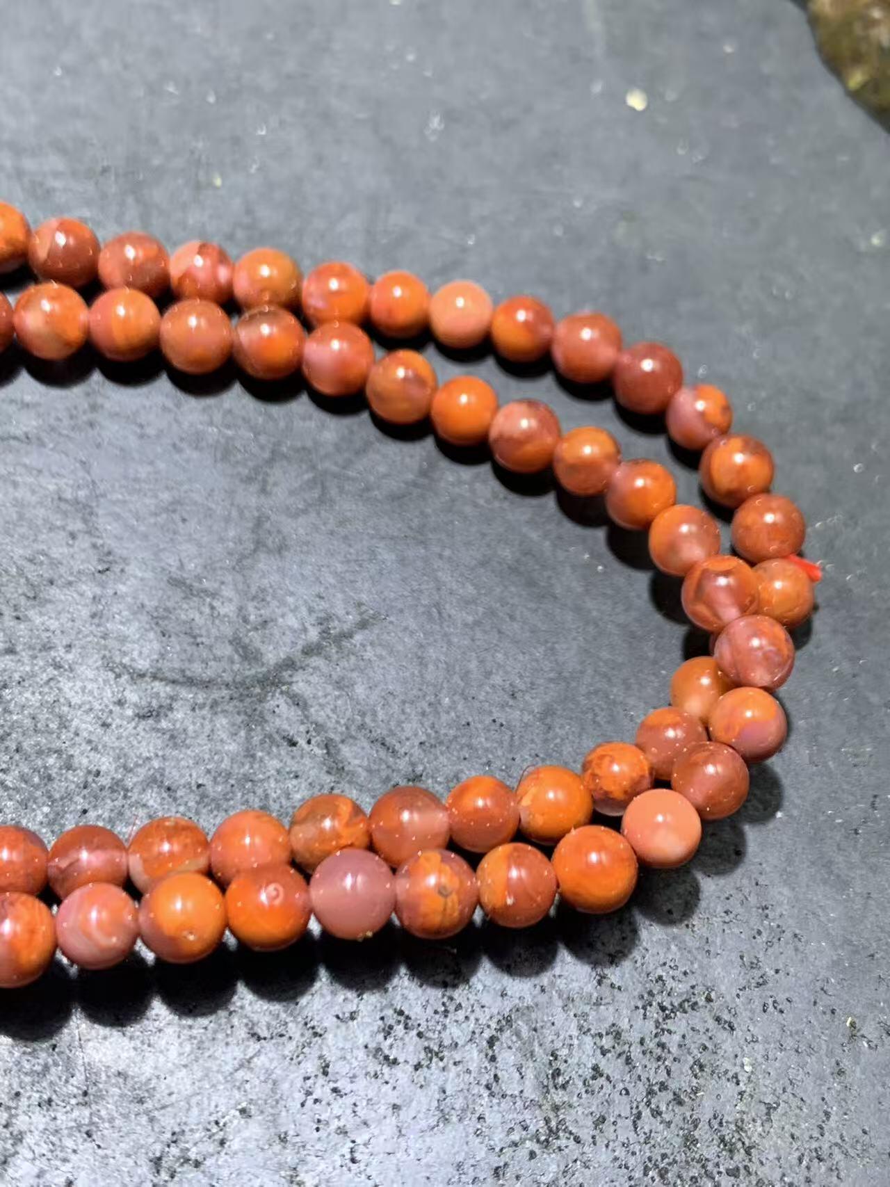 川料南红玛瑙冰飘柿子红多圈手串一条，