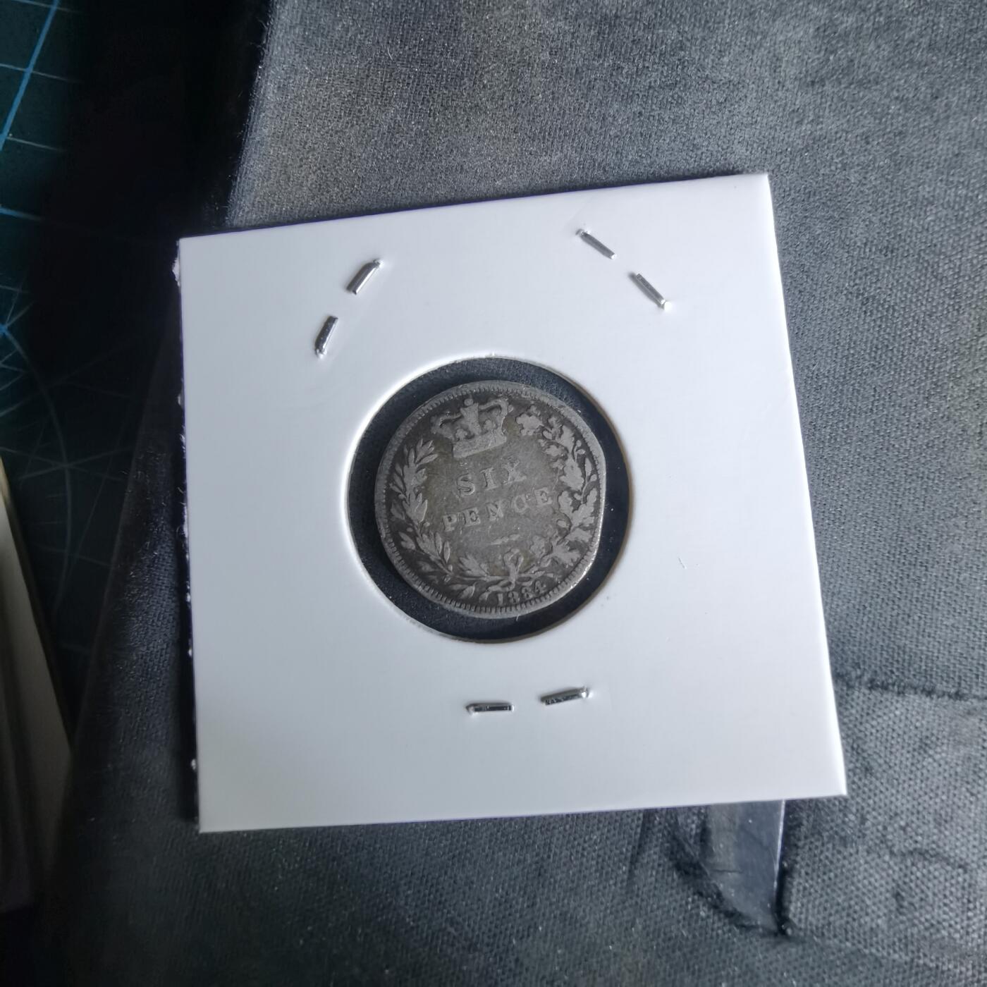 沼泽如烟--第991场 英国1884年6便士银币