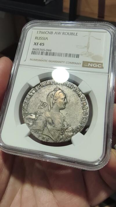 修遠堂世界钱币第104期 NGC XF45 1766年沙俄1卢布银币，带底光，个人认为是AU品