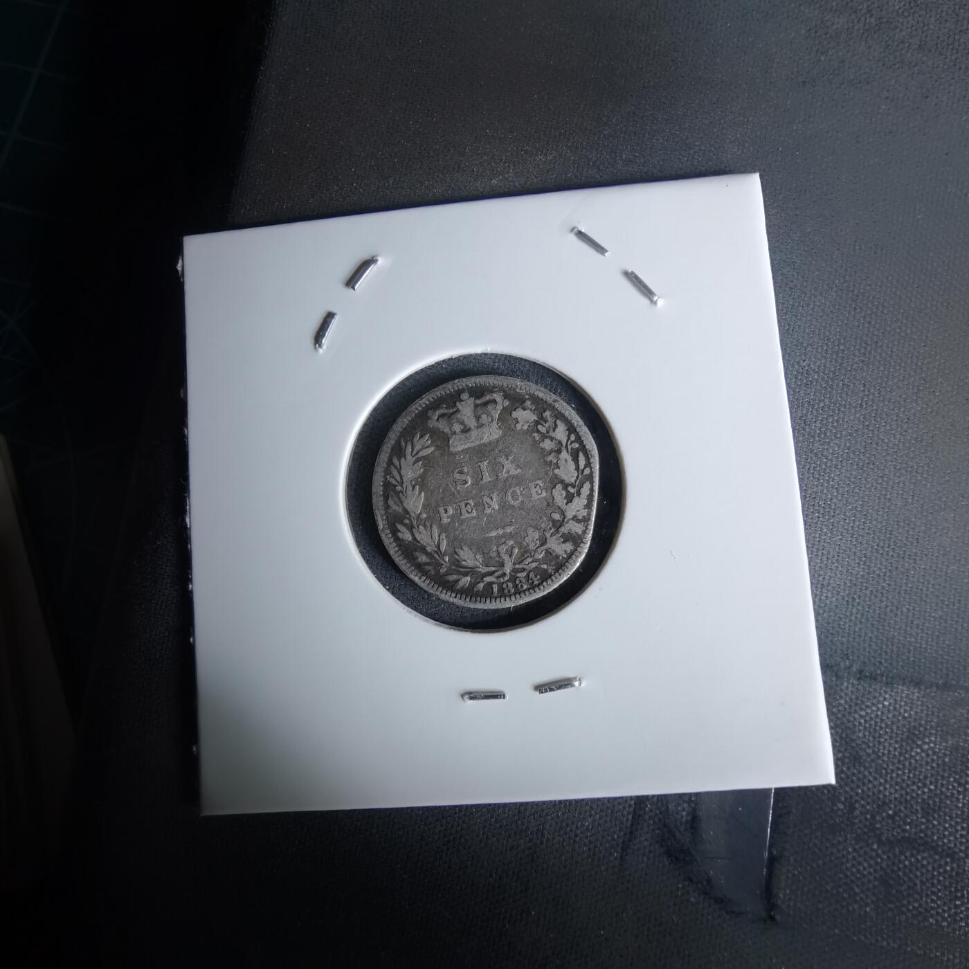 沼泽如烟--第991场 英国1884年6便士银币