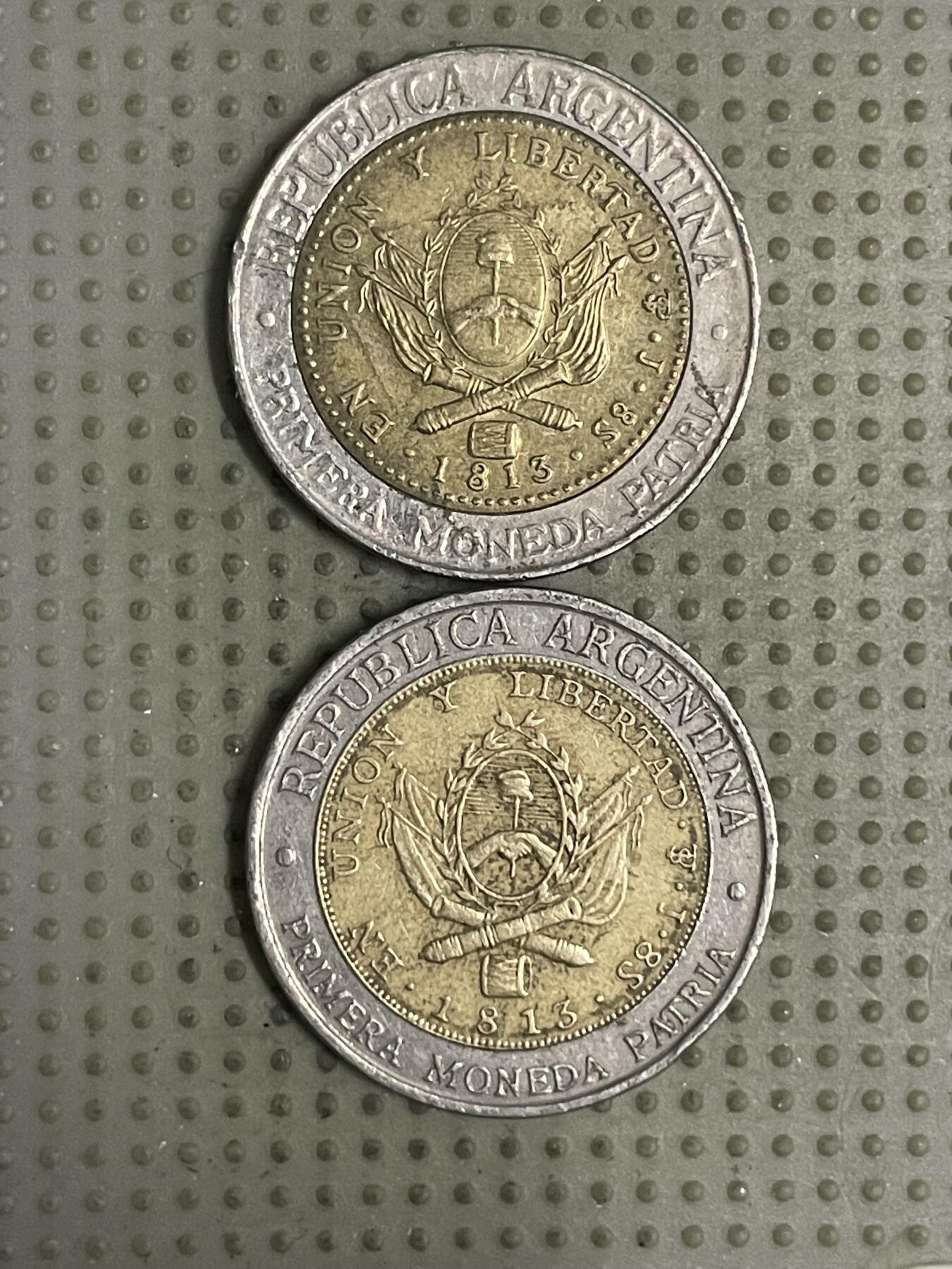 2026年第24场各国散币拍卖（总第174场）年前发货截止到11号 阿根廷1比索2枚